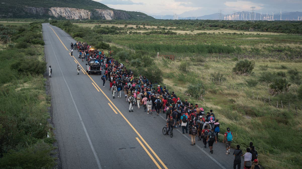 Hundreds of migrants are heading in a migrant caravan called the 'Rey de Reyes' toward the U.S. along the roads of southern Mexico in La Venta, the present-day Mexican state of Tabasco on Oct. 22, 2024. 