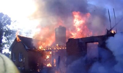 Georgia passerby saves man from burning home by kicking down storm door