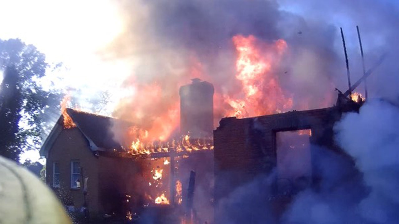 Georgia passerby saves man from burning home by kicking down storm door