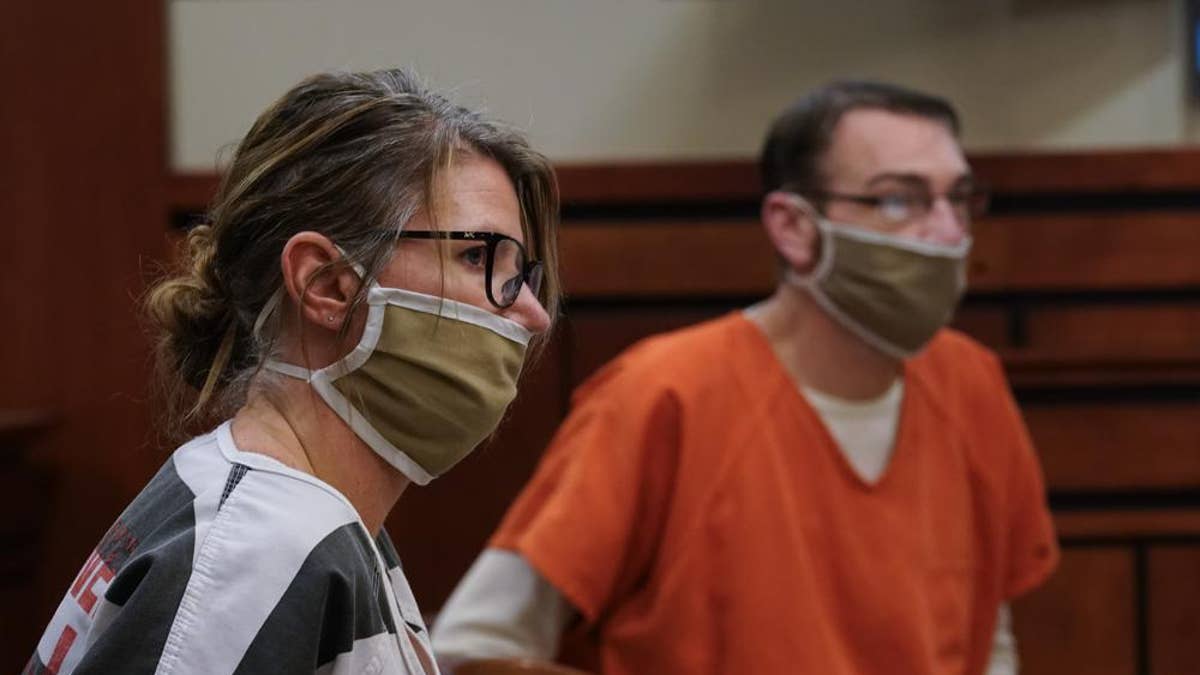 Jennifer and James Crumbley, the parents of Ethan Crumbley, a teenager accused of killing four students in a shooting at Oxford High School, appear in court.