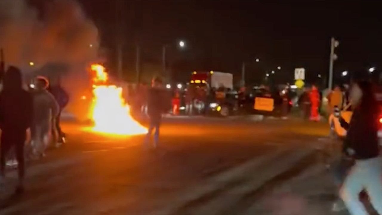 Fiery chaos at Florida intersection has sheriff's office searching for dozens of suspects