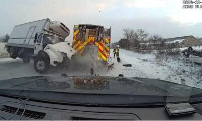 Wild dashcam video shows out-of-control truck slam into first responder vehicles on side of icy highway