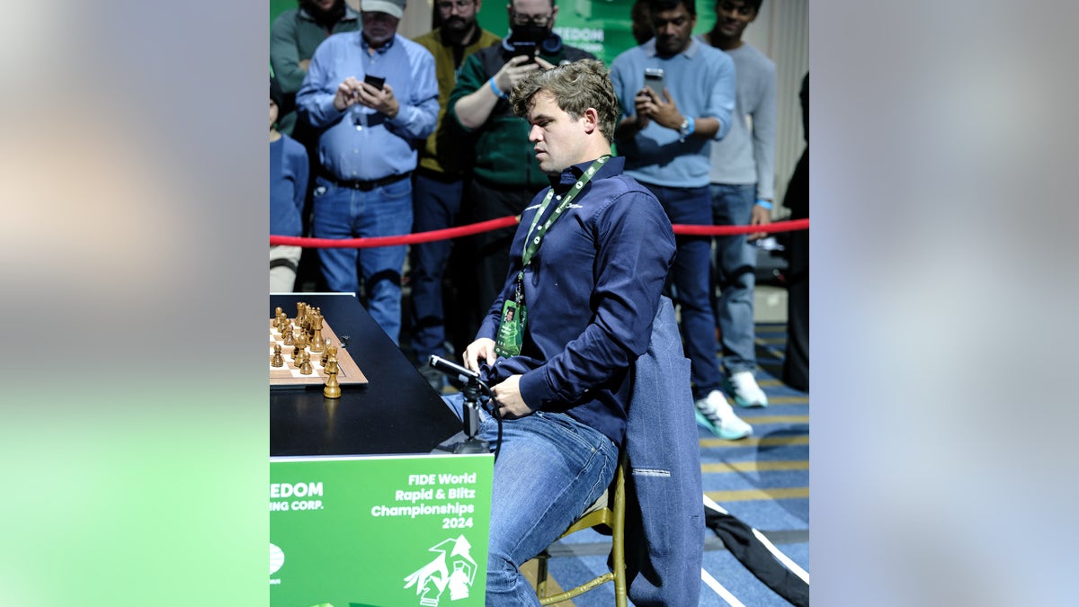 Magnus Carlsen plays a match