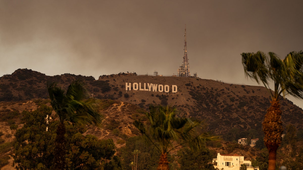 Hollywood sign with smoke from wildfires