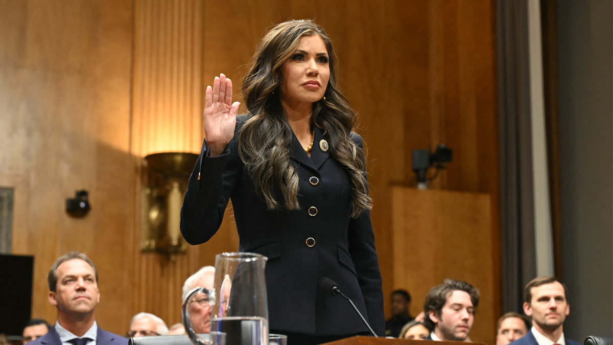 South Dakota Governor Kristi Noem is sworn in during a Senate Homeland Security and Governmental Affairs Committee hearing on her nomination to be Secretary of Homeland Security, on Capitol Hill in Washington, D.C., on January 17, 2025. 