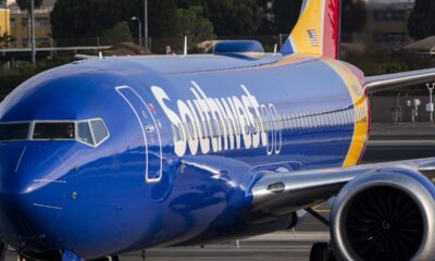 Two injured after cell phone battery sparks fire on Southwest flight in Denver