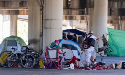 Neighborhood rocked by homeless camp triple murder as former police officer calls for government to intervene