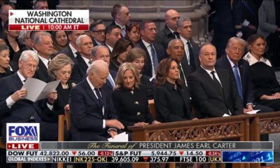 Trump chats up Obama while Clintons, Harris, ignore president-elect at Jimmy Carter funeral