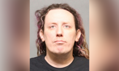 Woman arrested after explosives discovered at Tesla dealership