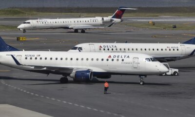 Delta plane wing clips runway during botched landing at LaGuardia Airport