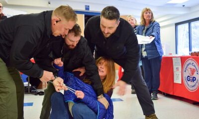 Private security guards who dragged Idaho woman from town hall meeting hit with charges