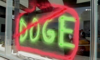 Climate vandals spray paint NYC Tesla dealership in Earth Day protest, clean it off when police arrive