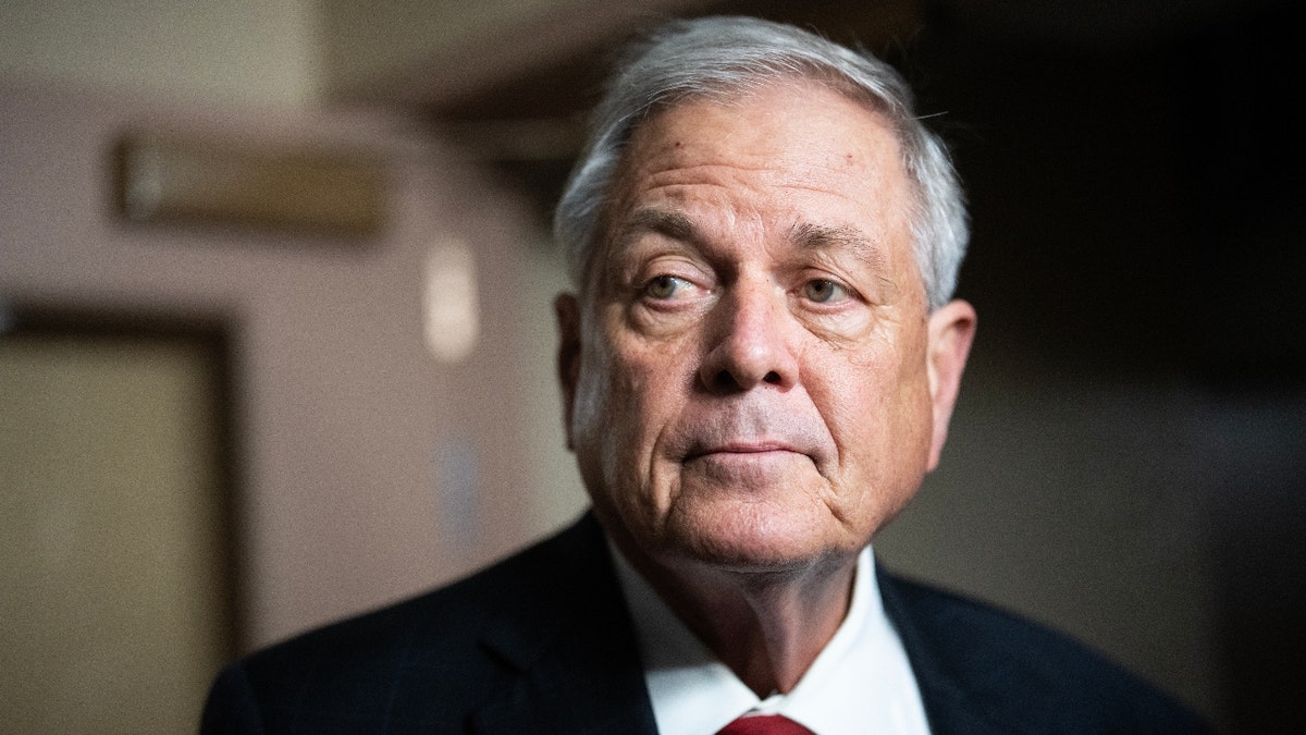 Rep. Ralph Norman looks on