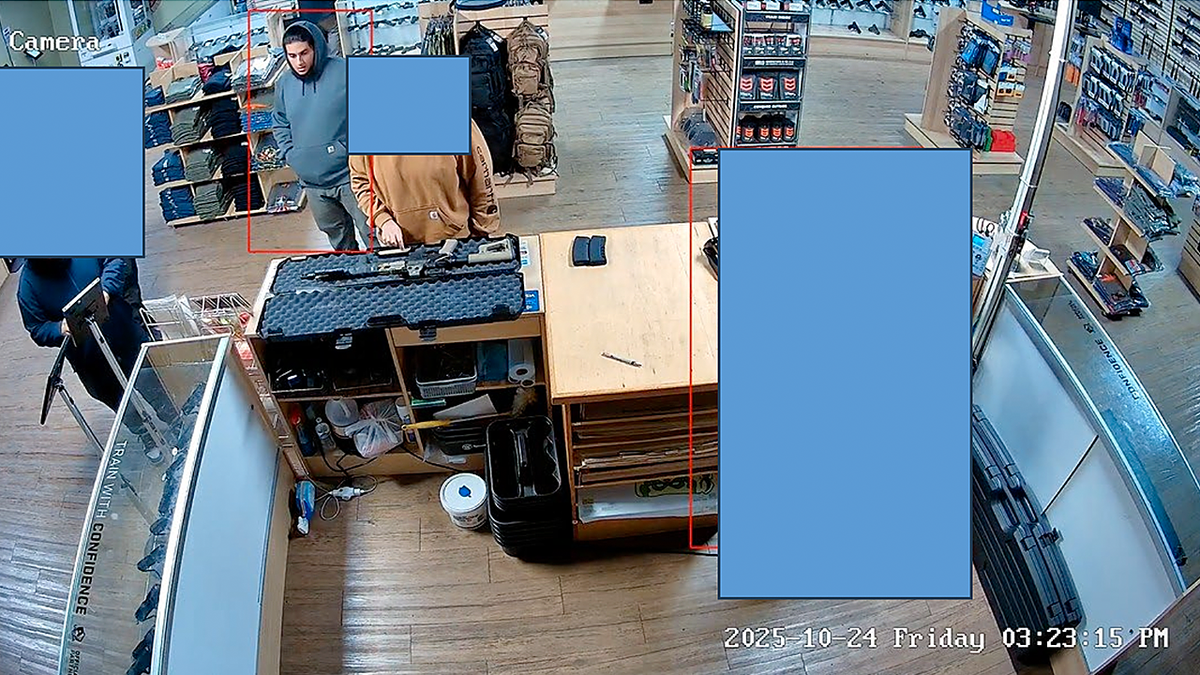 Alleged Halloween plotters Ali, Person 1 and Co-conspirator 5 seen on surveillance video at a gun range counter.