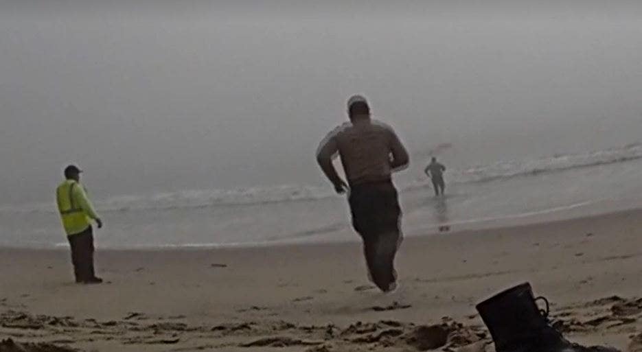 LA deputies caught on camera racing into foggy ocean to rescue disoriented paragliders
