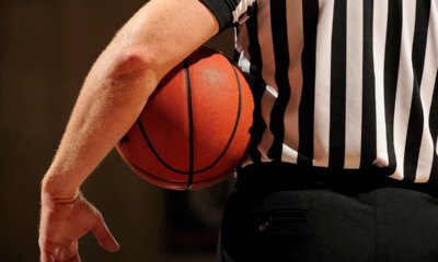 Middle school basketball fight results in adult getting tased as announcer nonchalantly calls the action
