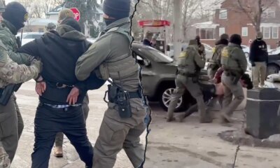 Wild video shows federal agents detaining 2 men at Minnesota gas station as agitators gather