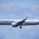 Inquiry begun after American Airlines flight reports mysterious blue light while trying to land