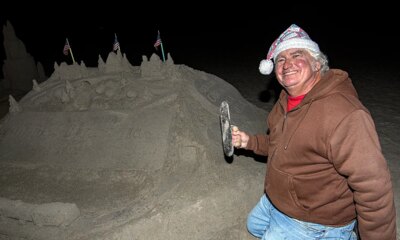Beloved sandcastle artist booted from California beach by luxury hotel after nearly 20 years
