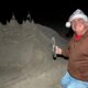 Beloved sandcastle artist booted from California beach by luxury hotel after nearly 20 years