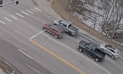 Terrifying moment caught on camera as road collapse suddenly swallows vehicles at busy intersection