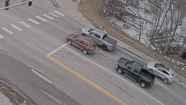 Terrifying moment caught on camera as road collapse suddenly swallows vehicles at busy intersection