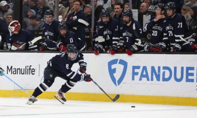 College hockey game thrown into chaos as lights turn off in arena during pivotal moment of OT